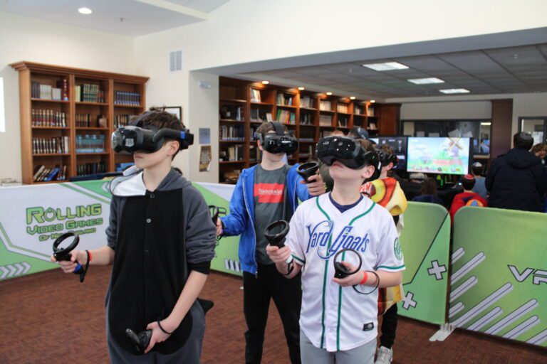 people playing free roam virtual reality game rolling video games connecticut vr entertainment