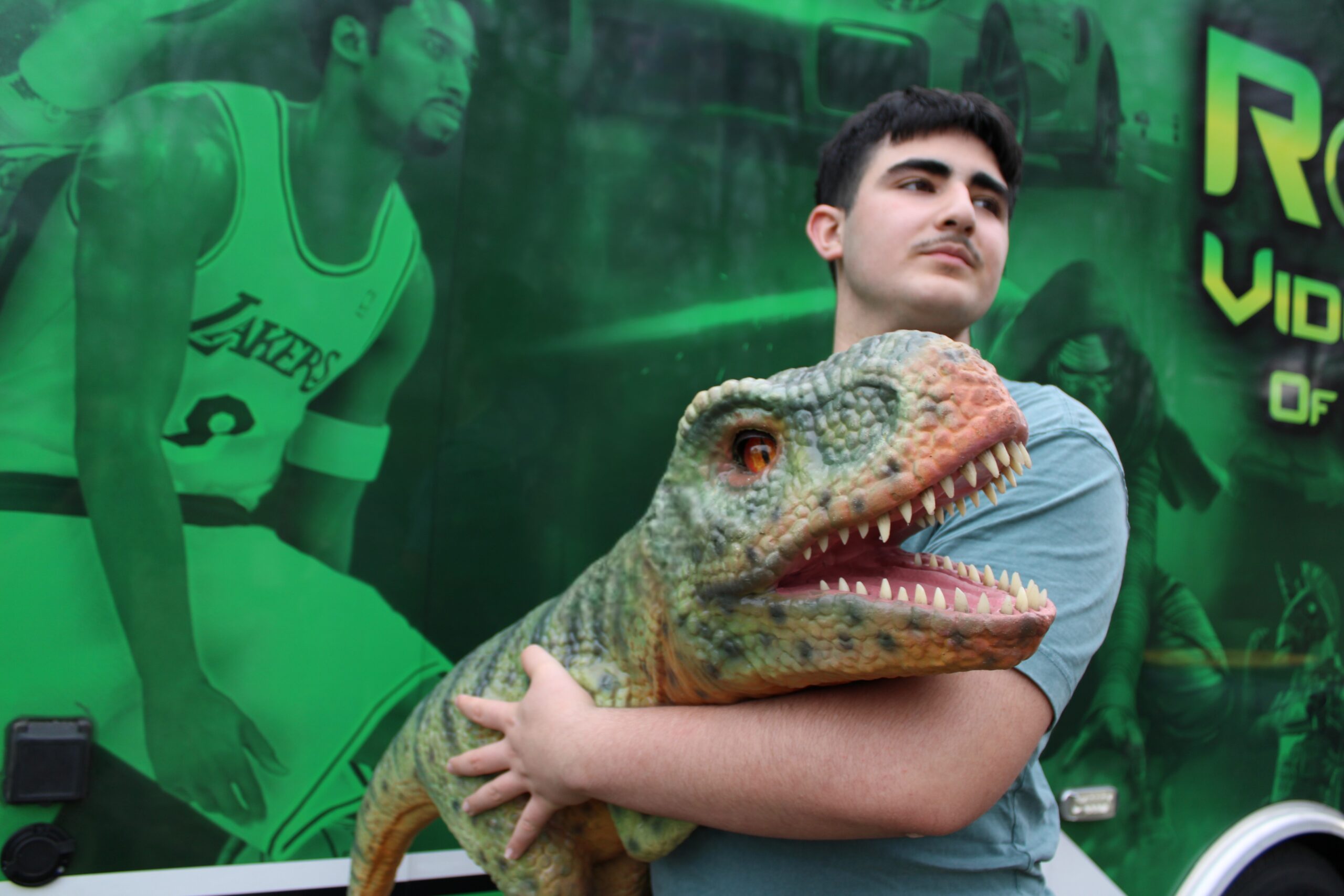 dinosaur party entertainment kids rolling video games connecticut interactive dinosaur character