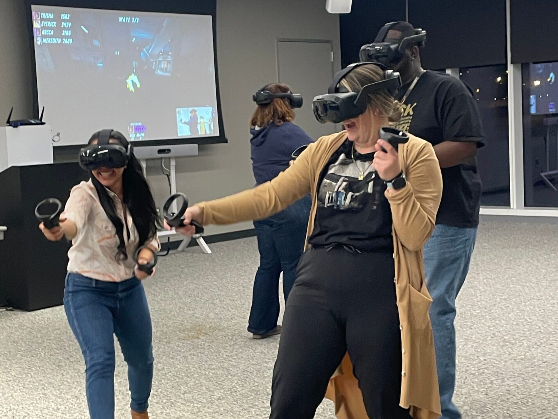 Six players participating in a free roam virtual reality gaming experience hosted by Rolling Video Games